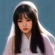 香港女演员侧影，1990年代风格的发型与妆容，呈现港产经典三级时代的演员形象气质